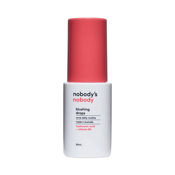 Nobody's Nobody blushing drops bottle with pink cap, hyaluronic acid, vitamin B5