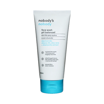 Nobody's Nobody face wash tube with blue cap, pH balanced, niacinamide, vitamin B5, aloe vera, chamomile extract.